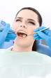Dentist examines the dentes of the patient