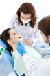 Dentist drills a decayed tooth of the patient