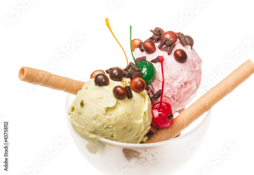 Photo: yogurt and chocolate ice cream in a bowl close up yogurt and chocolate ice cream in a bowl close up