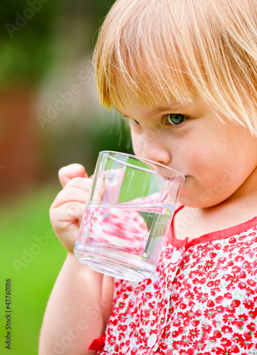 Photo: Child with cup of water Child with cup of water