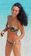 Beautiful laughing woman in a bikini