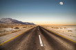 Photo: road in desert under the moon road in desert under the moon