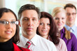 Business - Team oder Geschäftsleute in einem Büro