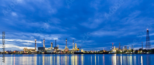 Photo: Oil refinery plant along river in Bangkok Oil refinery plant along river in Bangkok