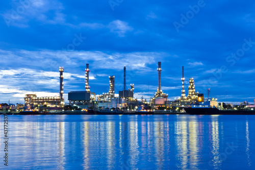 Photo: Oil refinery plant along river in Bangkok Oil refinery plant along river in Bangkok