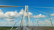 Highway bridge crosses a river, time lapse clip