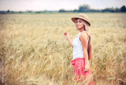 Photo: portrait of the rural girl in field portrait of the rural girl in field