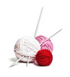 a group of multi-colored balls of yarn and knitting needles
