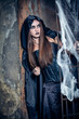 Portrait of a young witch. Halloween, horror.