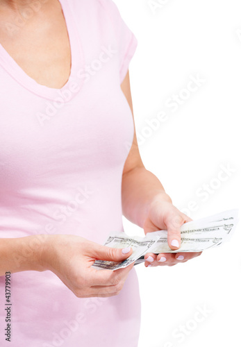Foto: Counting out her cash Counting out her cash