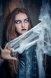 Portrait of a young witch. Halloween, horror.