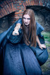 Portrait of a young witch. Halloween, horror.