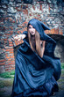 Portrait of a young witch. Halloween, horror.