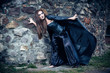 Portrait of a young witch. Halloween, horror.