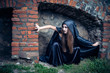 Portrait of a young witch. Halloween, horror.