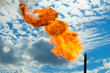 Gas flaring. Torch against the sky.