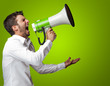 Portrait Of A Man Yelling Into A Megaphone