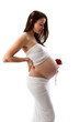 Beautiful pregnant brunette lady on white background