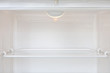 Open empty white refrigerator