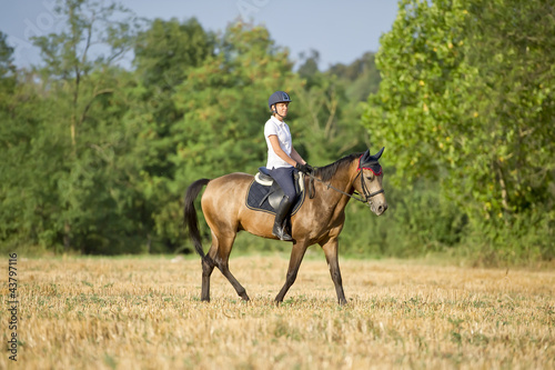 Photo: Riding a stroll through the fields in the nature Riding a stroll through the fields in the nature
