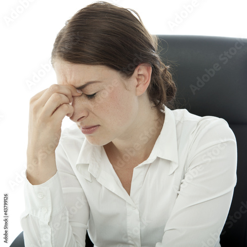 Photo: young brunette business woman headache touch her head young brunette business woman headache touch her head