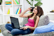 Photo: Young girl using modern technology Young girl using modern technology