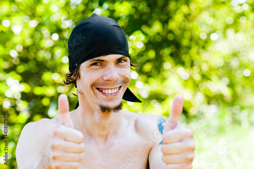 Photo: portrait of a man confident in the success of portrait of a man confident in the success of