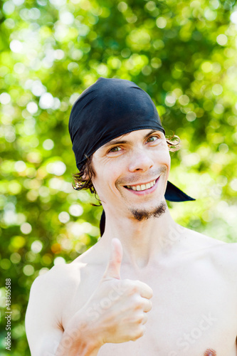 Photo: portrait of a man confident in the success of portrait of a man confident in the success of
