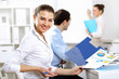 Foto: Young business people working together Young business people working together