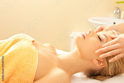 Photo: beautiful woman in massage salon beautiful woman in massage salon