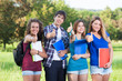 Teenage Students with Thumbs up