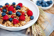 Muesli with raspberries, blueberries, beans and raisins