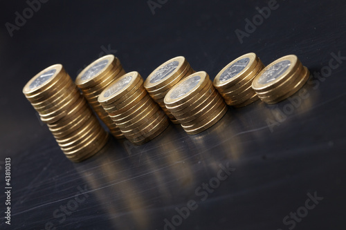 Photo: coins on the black background coins on the black background
