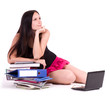 Beautiful young woman with computer PC and books