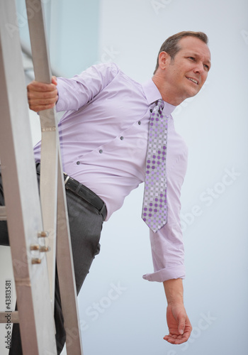 Photo: Businessman searching for opportunity Businessman searching for opportunity