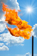 Gas flaring. Torch against the sky.