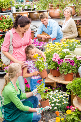 Photo: Family garden center shopping for flowers Family garden center shopping for flowers