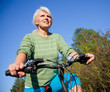 Foto: mature woman with bicycle mature woman with bicycle