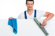 fensterputzer mit werbeschild