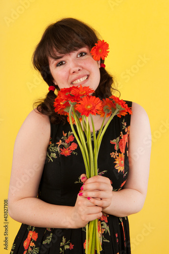 Photo: Teen girl with flowers Teen girl with flowers