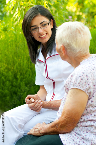 Photo: Chatting with sick elderly woman Chatting with sick elderly woman