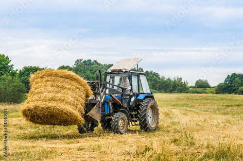 Photo: tractor with a hay tractor with a hay