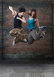 Passion dance couple jumping.