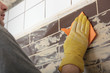 Grouting ceramic tiles