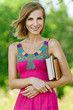 Photo: beautiful young woman with books beautiful young woman with books