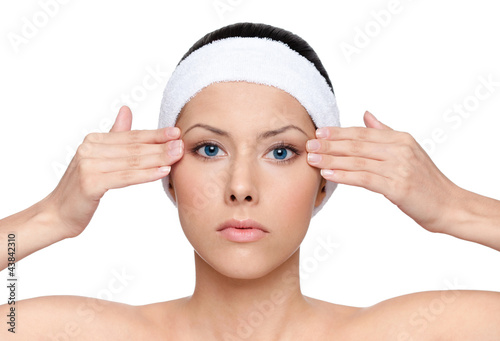 Photo: Facelift for a young pretty woman, isolated, white background Facelift for a young pretty woman, isolated, white background