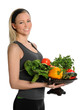 Foto: Young Woman Holding Bowl with Fuits and Vegetables Young Woman Holding Bowl with Fuits and Vegetables