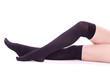 Photo: Sexy womanish legs isolated on the white Sexy womanish legs isolated on the white