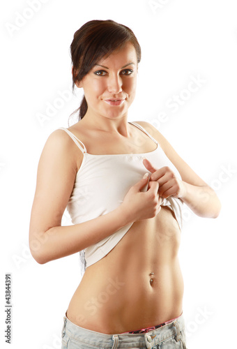 Photo: A young woman showing her belly A young woman showing her belly