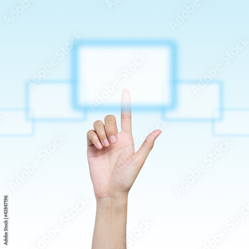 Photo: Hand pressing virtual button on futuristic holographic screen. Hand pressing virtual button on futuristic holographic screen.
